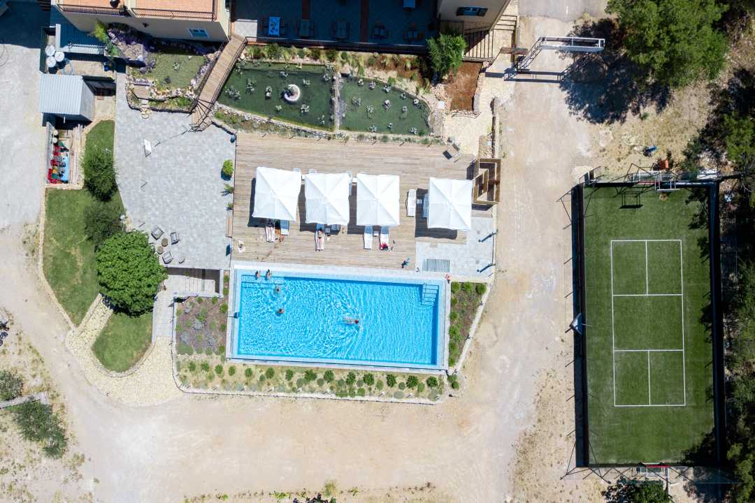 Spacious outdoor pool area with panoramic views